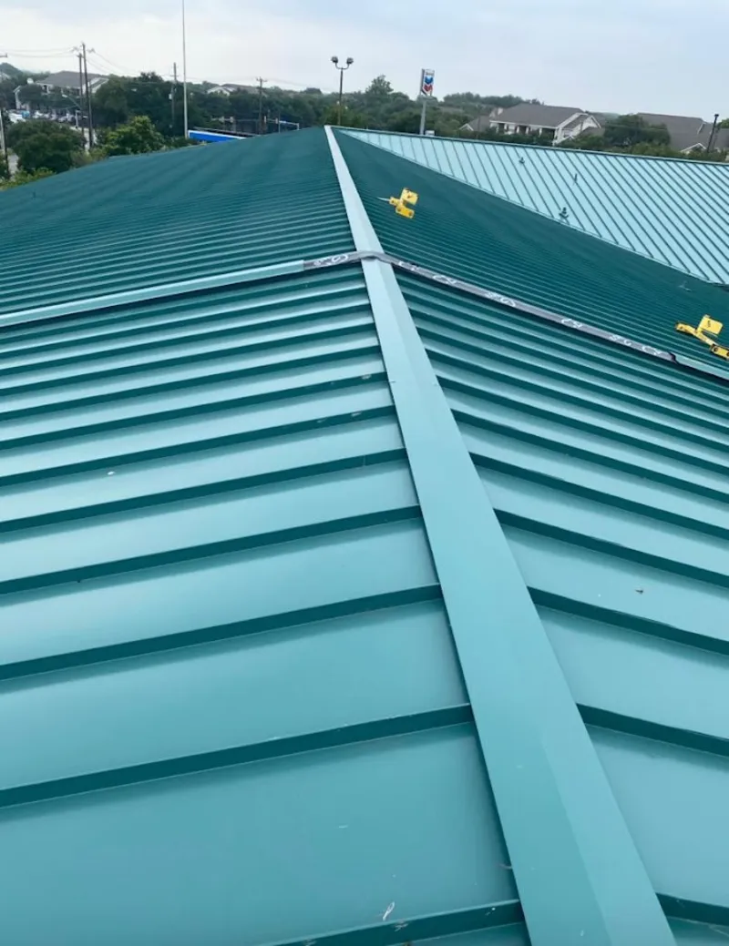 Green commercial metal roof ridge and valley for Metal Roof Repair in Half Moon